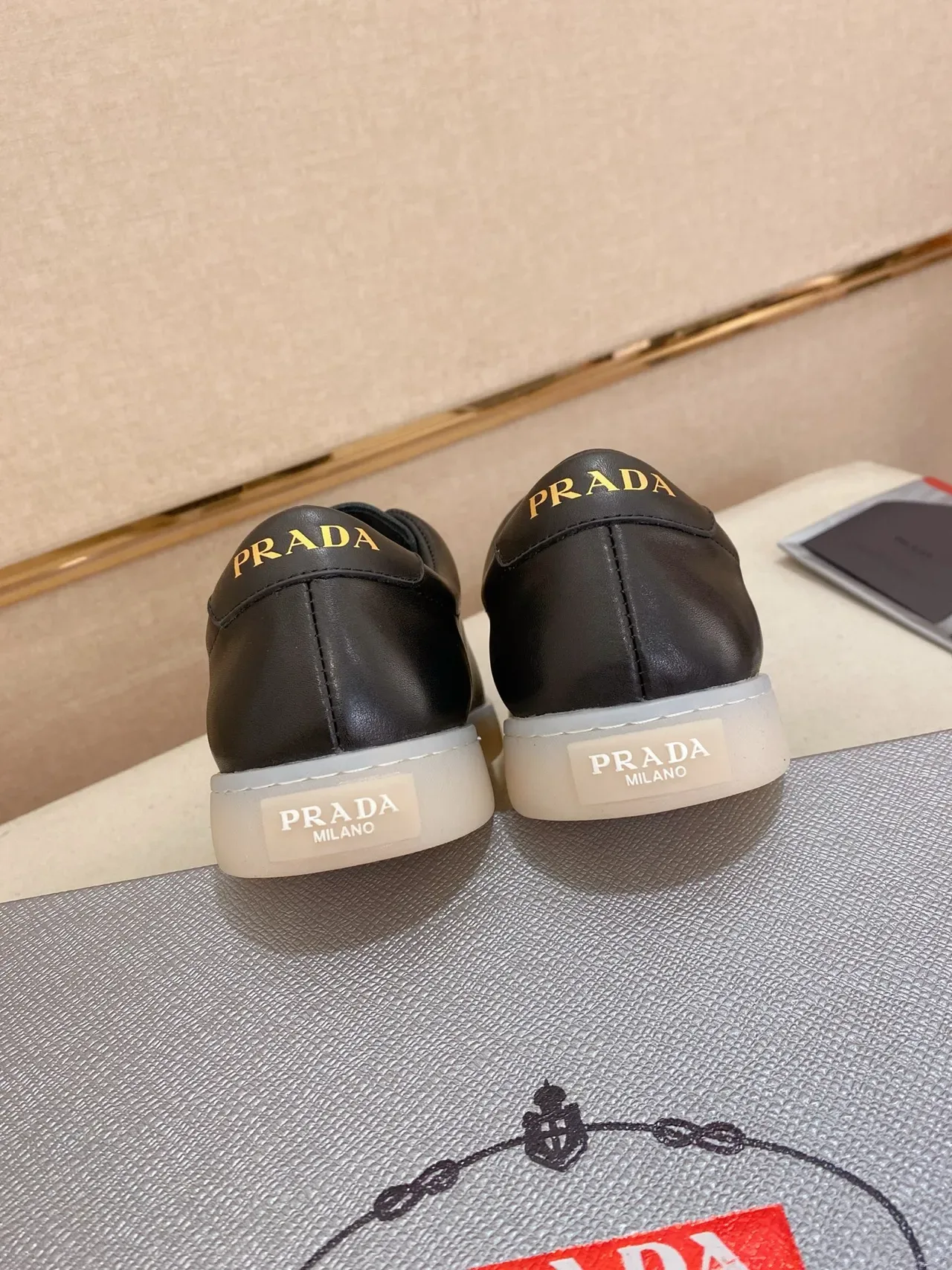 Prada Black White Smooth Leather Upper Gold-Tone Triangular Logo Plaque Lifestyle Sneakers 3