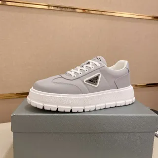 Prada Cloudbust رمادي أبيض حذاء رياضي منخفض التوب منصة سميك