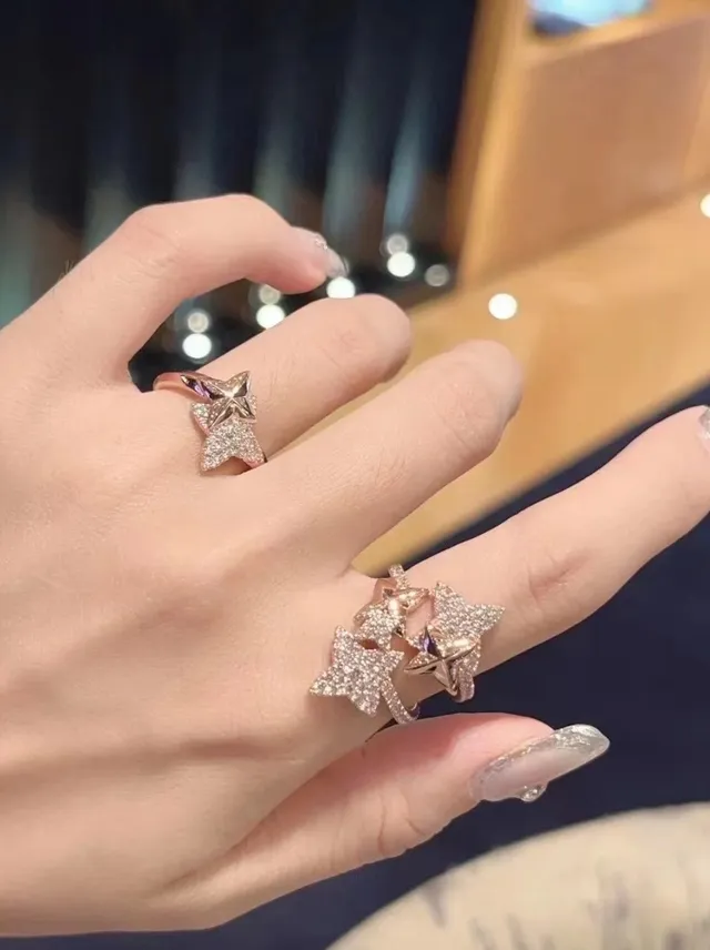 Tiffany & Co. नीला सोना बहुस्तरीय तारा मोटिफ पावे-सेट स्पष्ट पत्थर अंगूठी 3