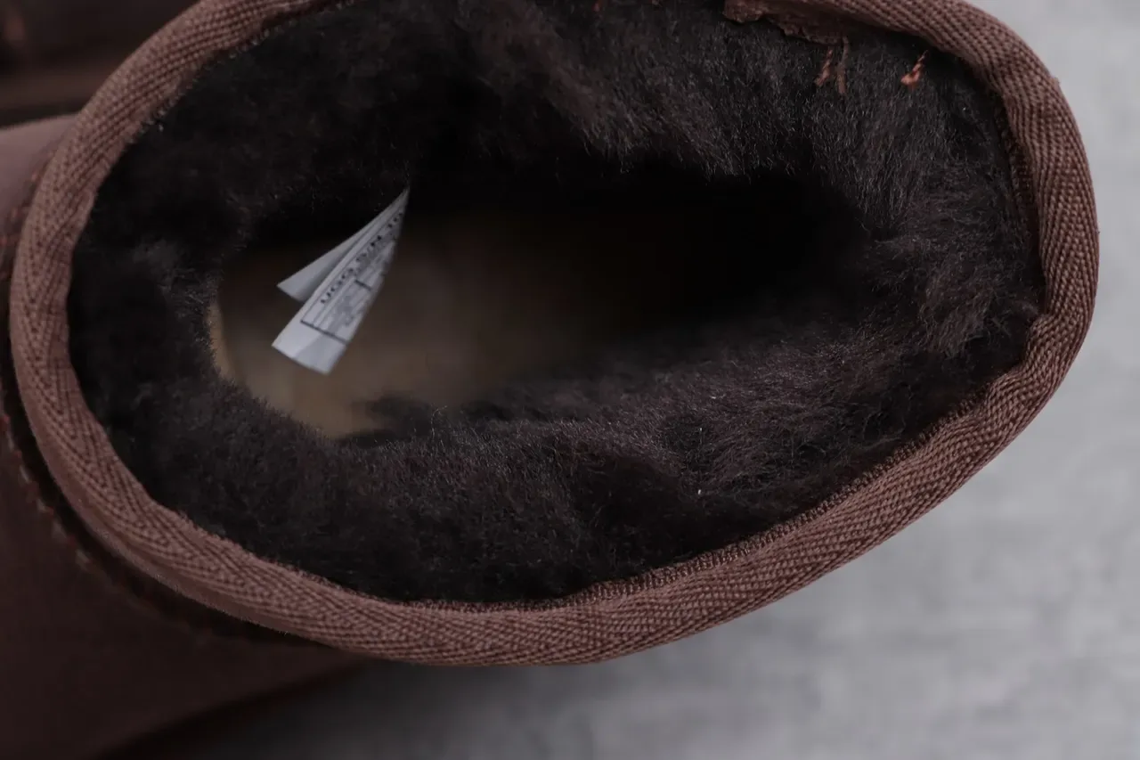UGG ब्राउन ब्लैक सूड ऊपरी शियरलिंग लाइन स्नो बूट 4