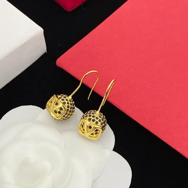Valentino VLTN Gold Black Spherical Cage Pavé Stones Earrings 4
