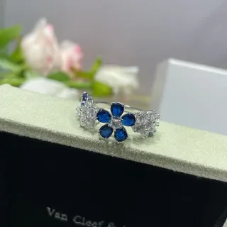 Van Cleef & Arpels Floral Motif Blue Sapphire and White Gemstone Ring