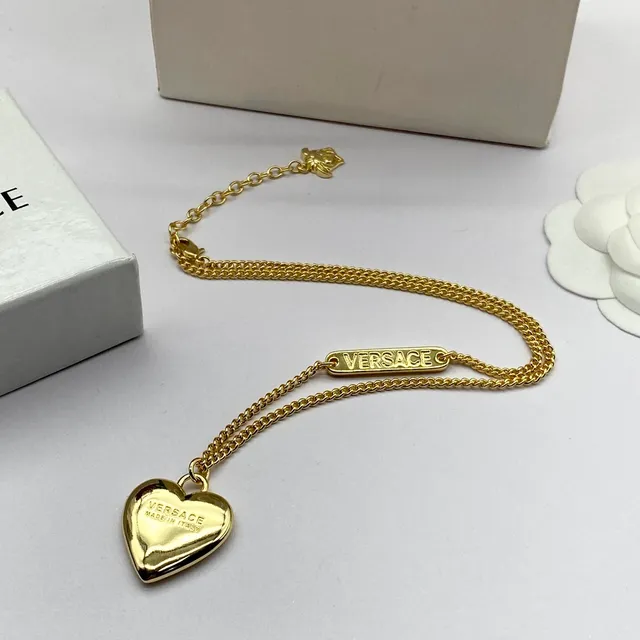 Versace pendentif cœur chaîne dorée 5