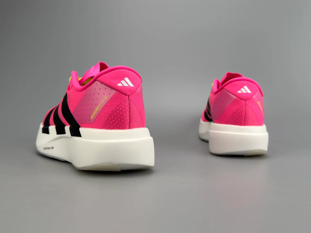 Adidas Adizero Evo 2 أحذية جري وردي نيون أصفر أسود 8