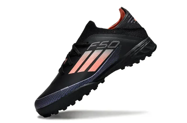 Adidas Chuteira low-cut preto laranja com upper de knit, detalhes de listras gradientes para grama artificial 4