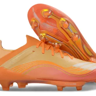 Adidas Chaussures de football orange doré à bas de coupe avec upper synthétique overlay à motif de vague surface de terrain ferme