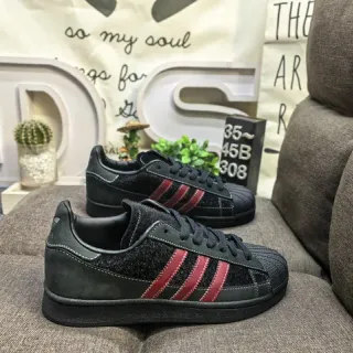 Adidas Superstar أحذية رياضية أسود وأحمر بنمط حياة