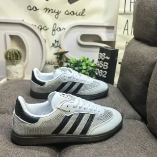 Adidas أبيض أسود شبكة مثقوبة علوية ثلاث شرائط أحذية رياضية أسلوب حياة