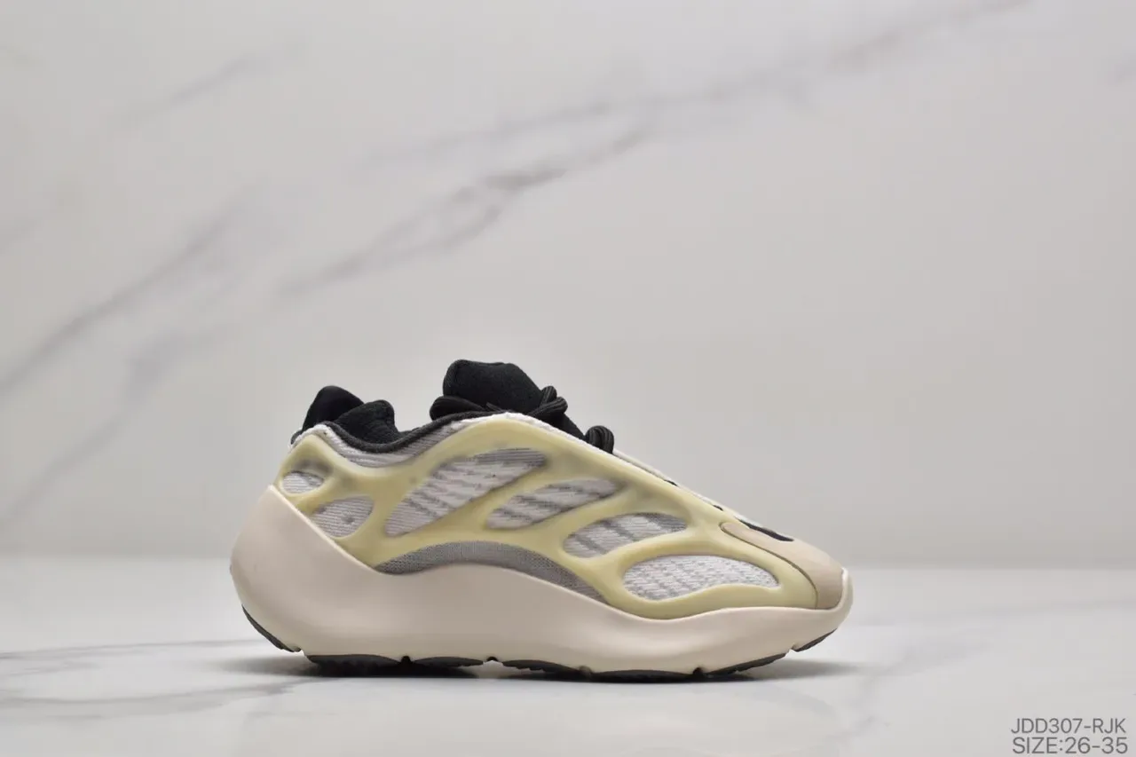 Adidas Yeezy Boost 700 Beige Noir Sculpté Semelle Intermédiaire Cage Superposition Construction Sneakers Lifestyle 4