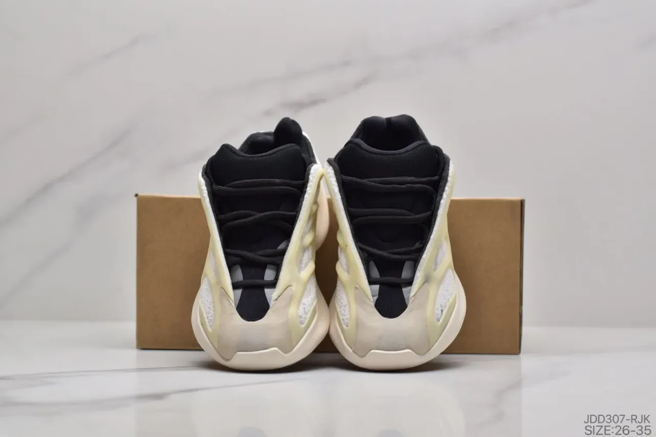 Adidas Yeezy Boost 700 Beige Noir Sculpté Semelle Intermédiaire Cage Superposition Construction Sneakers Lifestyle 9