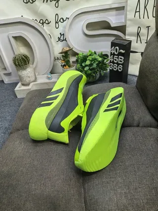 Adidas حذاء أسلوب حياة أصفر أسود بدون أربطة slip-on مع علوى نسيج 6