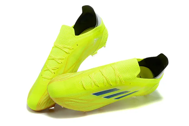 Adidas Sapatos de futebol com solado para terra firme, parte superior em degradê neon amarelo e azul escuro com triple listras 2