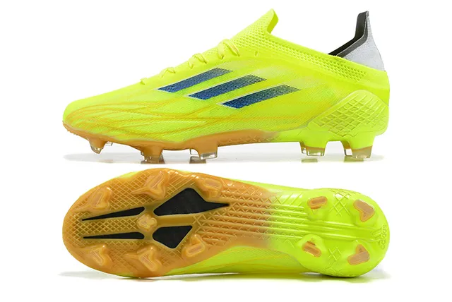 Adidas Sapatos de futebol com solado para terra firme, parte superior em degradê neon amarelo e azul escuro com triple listras 9