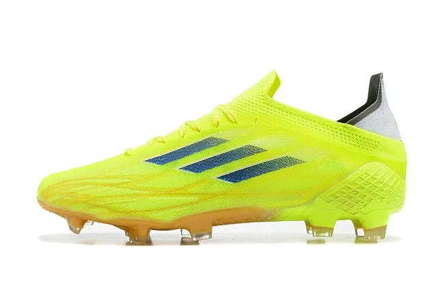 Adidas Sapatos de futebol com solado para terra firme, parte superior em degradê neon amarelo e azul escuro com triple listras 10