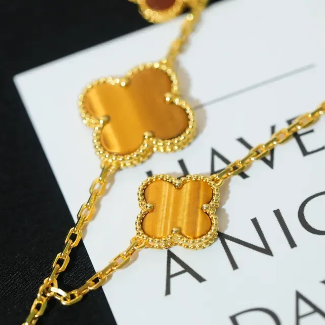 Burberry Almond Motif Multi-Pendant Gold-Tone Resin Bracelet 6