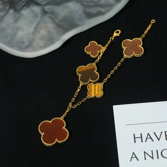 Burberry Almond Motif Multi-Pendant Gold-Tone Resin Bracelet 9