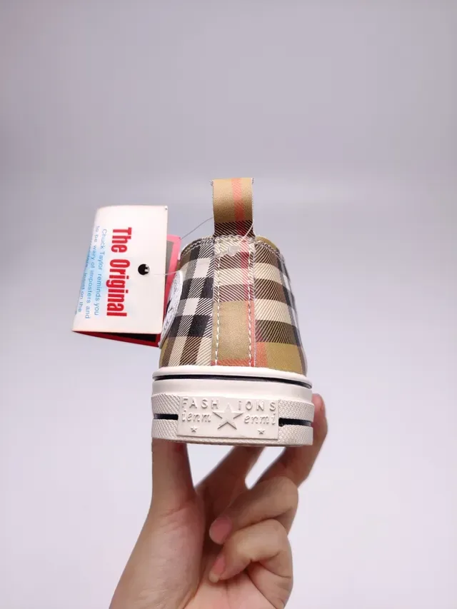 Burberry حذاء رياضي عالي الارتفاع من القماش الكانفاس بنقشة Plaid 3