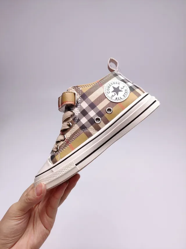 Burberry حذاء رياضي عالي الارتفاع من القماش الكانفاس بنقشة Plaid 8