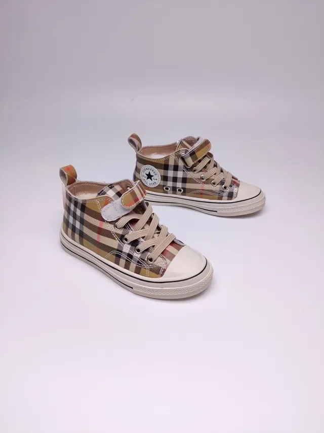 Burberry حذاء رياضي عالي الارتفاع من القماش الكانفاس بنقشة Plaid 9