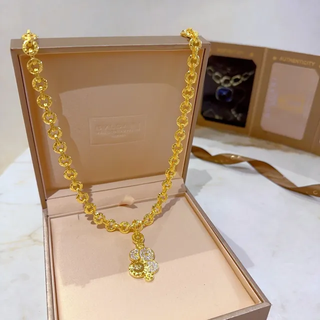 Bvlgari Corrente de elos de corda texturizada em ouro e prata com pendentif circular de estilo moeda em cascata 2
