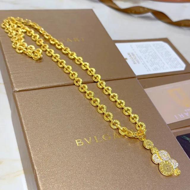 Bvlgari Corrente de elos de corda texturizada em ouro e prata com pendentif circular de estilo moeda em cascata 3