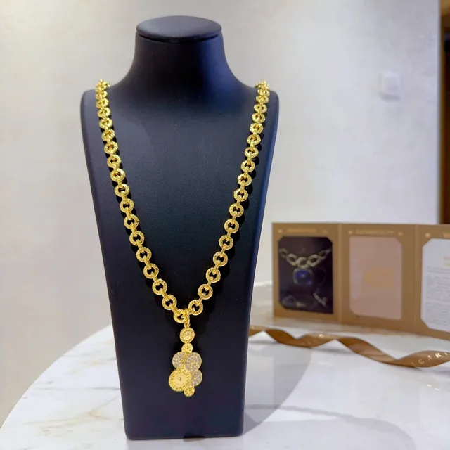 Bvlgari Corrente de elos de corda texturizada em ouro e prata com pendentif circular de estilo moeda em cascata 4