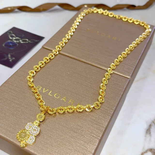 Bvlgari Corrente de elos de corda texturizada em ouro e prata com pendentif circular de estilo moeda em cascata 5