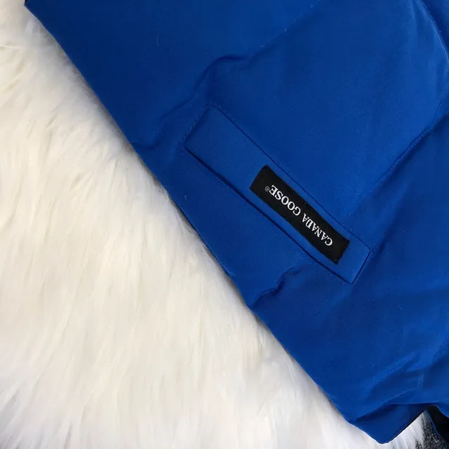Canada Goose صدرية بنفسجي أسود مبطنة عالية الياقة 19