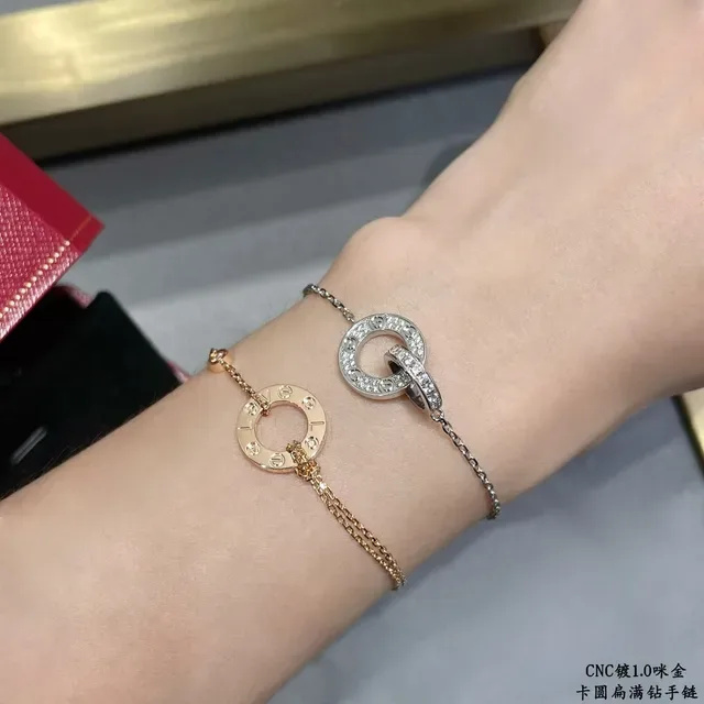 Cartier Pulsera de oro y plata con doble círculo entrelazado pavé piedras transparentes 9