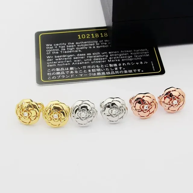 Chanel Camellia 金色花朵镂空金属耳环 9