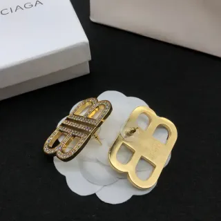 Chanel أقراط ذهبية شفافة كريستال باڤيه