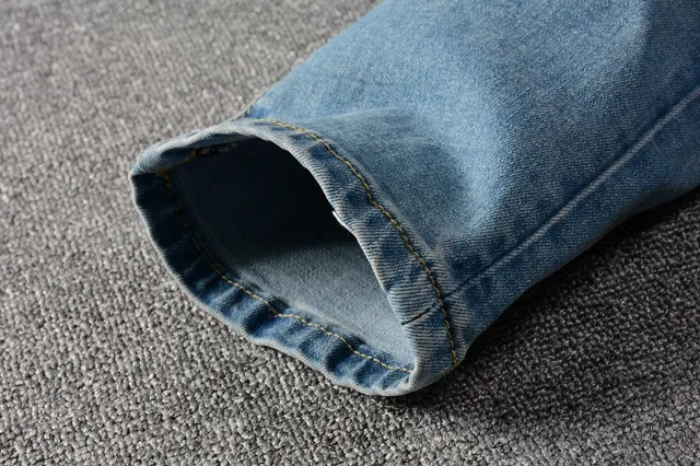 Distressed Slim-Fit Medium-Wash Blue Jeans 14