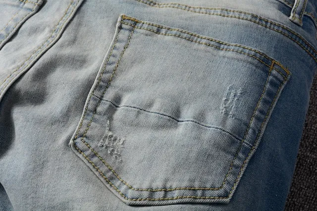 Distressed Slim-Fit Medium-Wash Blue Jeans 16