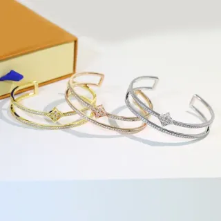 Pulsera de puño doble barra con bandas Pavé de cristal en oro y plata