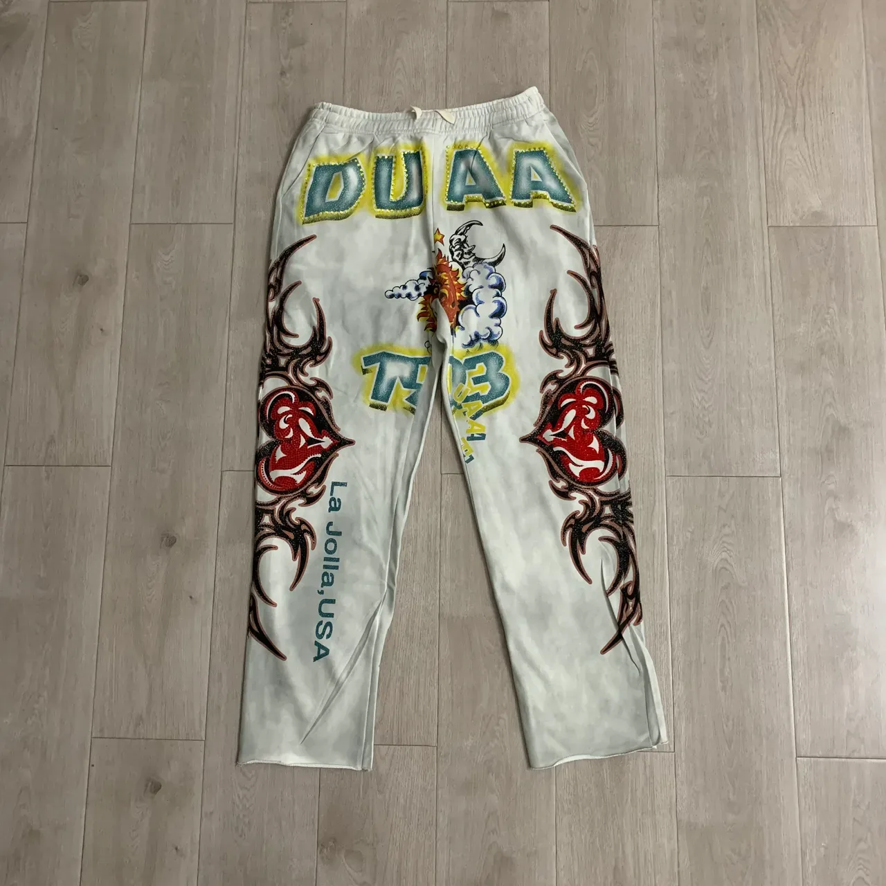 Graphic-Print Elastic-Waist Raw-Hem Loose Sweatpants 5