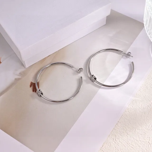 Aros de plata y oro de metal pulido 2