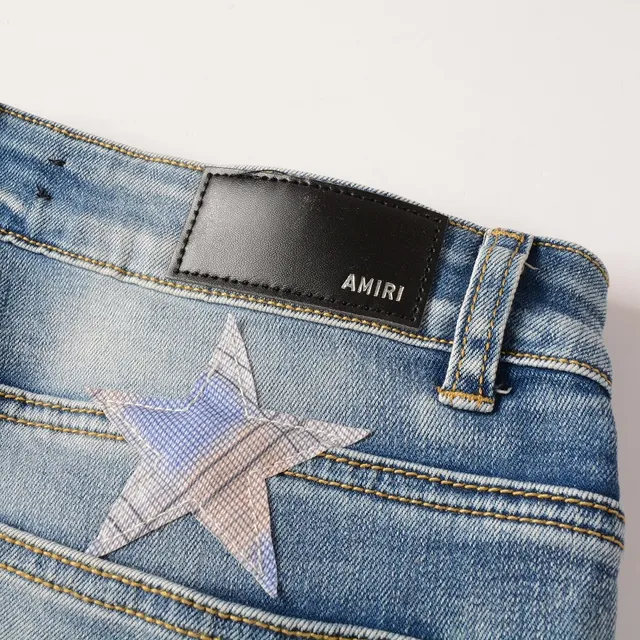 بناطيل جينز distressed light-wash slim-fit مطبوعة بنجمات 7