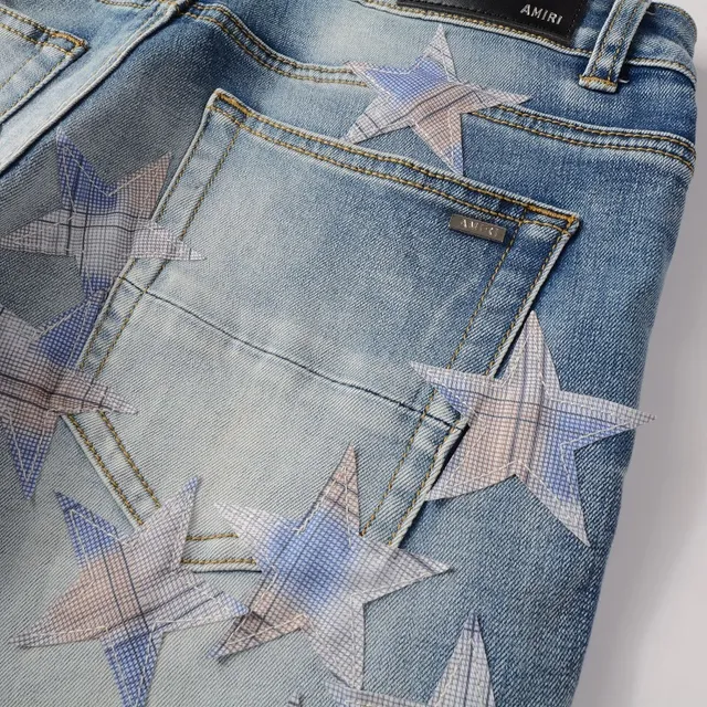 بناطيل جينز distressed light-wash slim-fit مطبوعة بنجمات 8