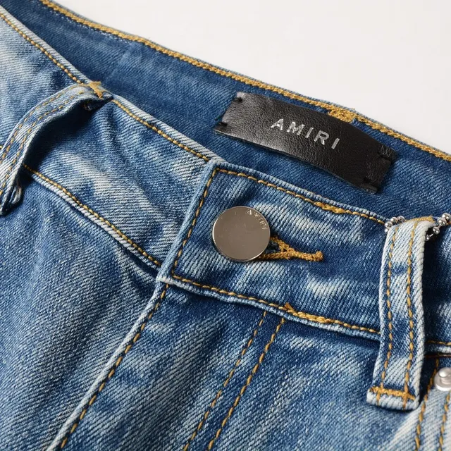 بناطيل جينز distressed light-wash slim-fit مطبوعة بنجمات 14