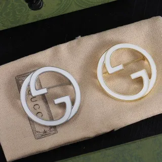 Gucci Double G Brooch White Enamel Silver and Gold Tone Brooches