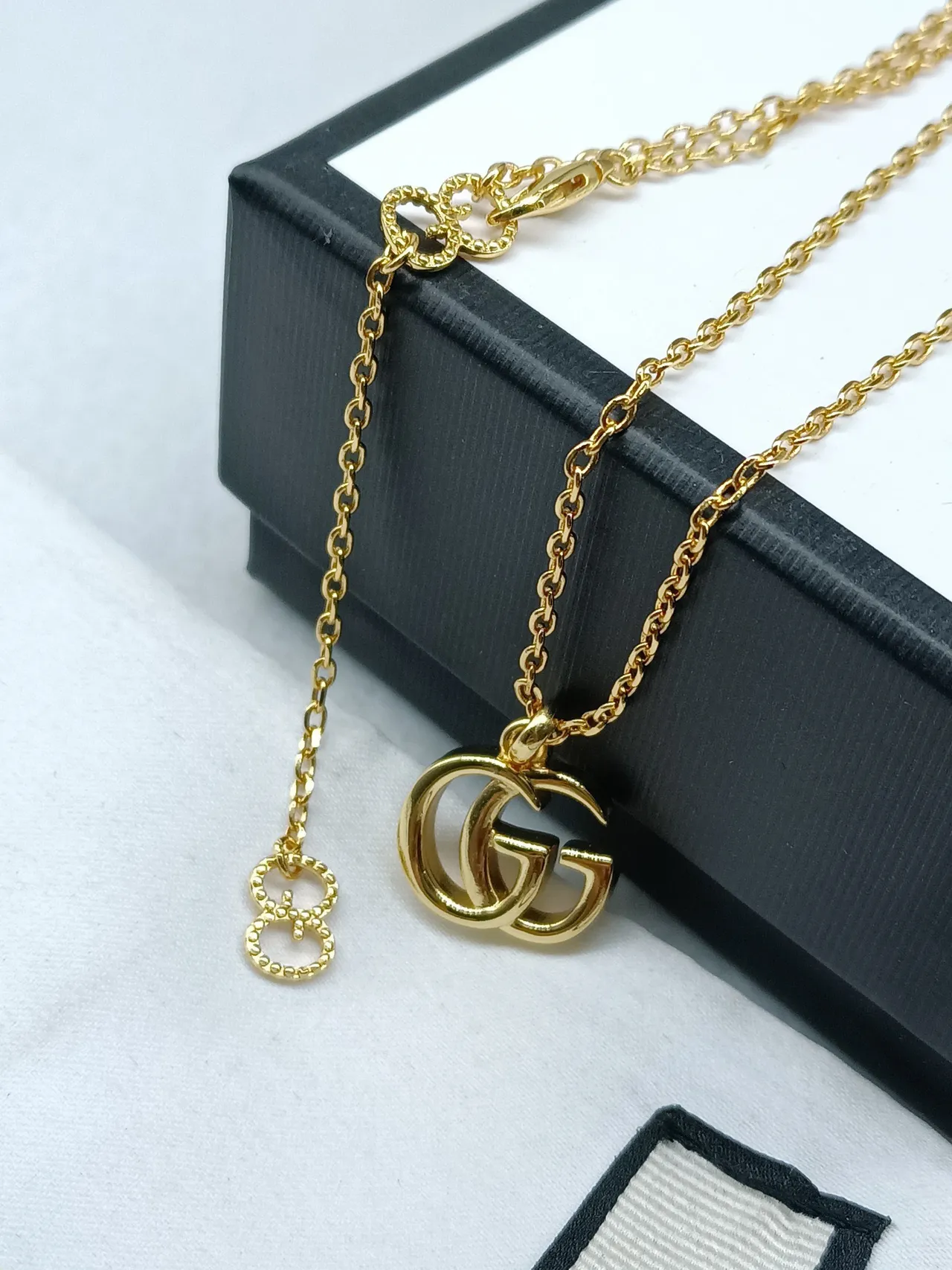 Gucci Double G Interlocking Logo Gold Tone মণিহারা 7
