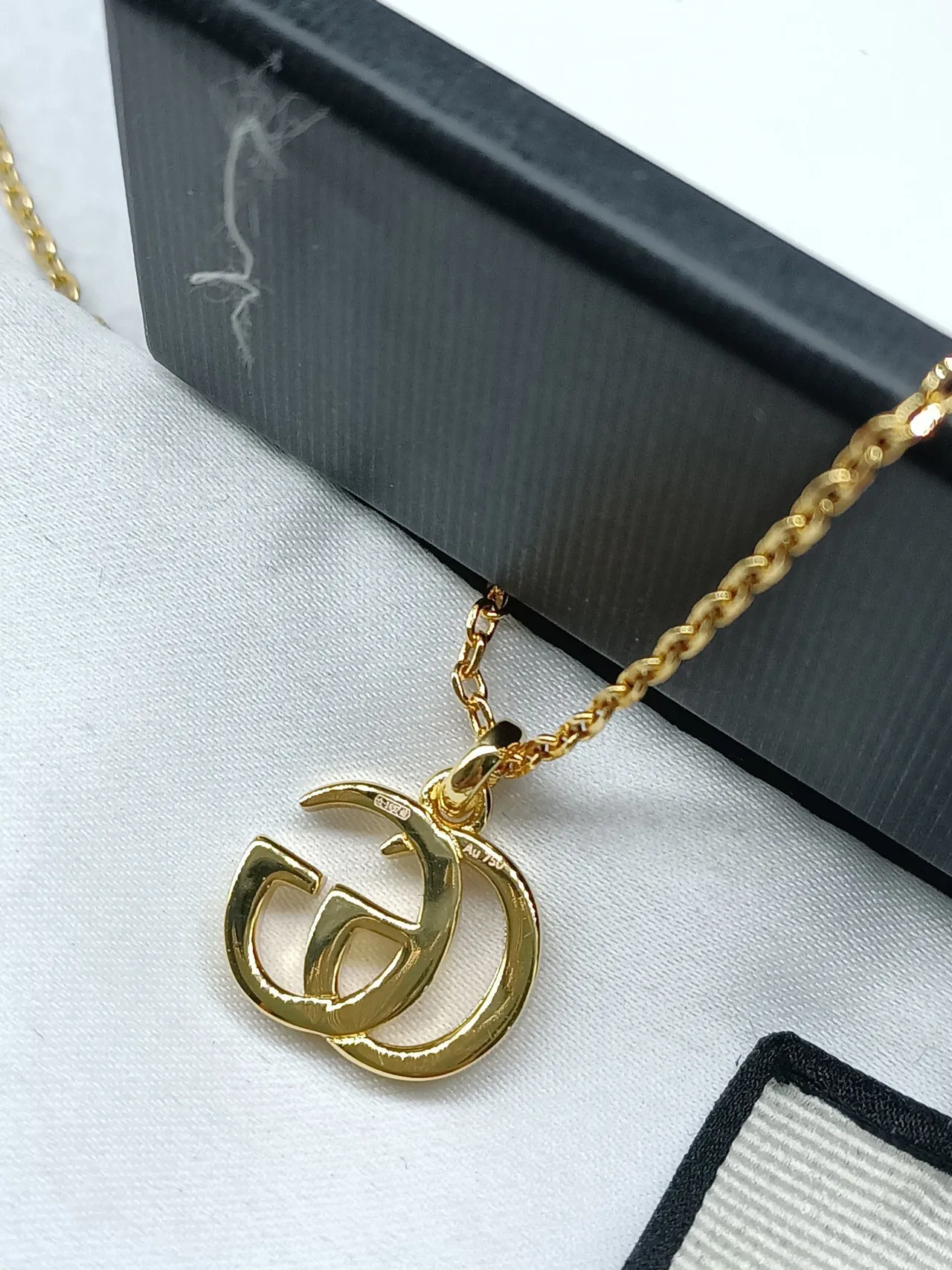 Gucci Double G Interlocking Logo Gold Tone মণিহারা 8