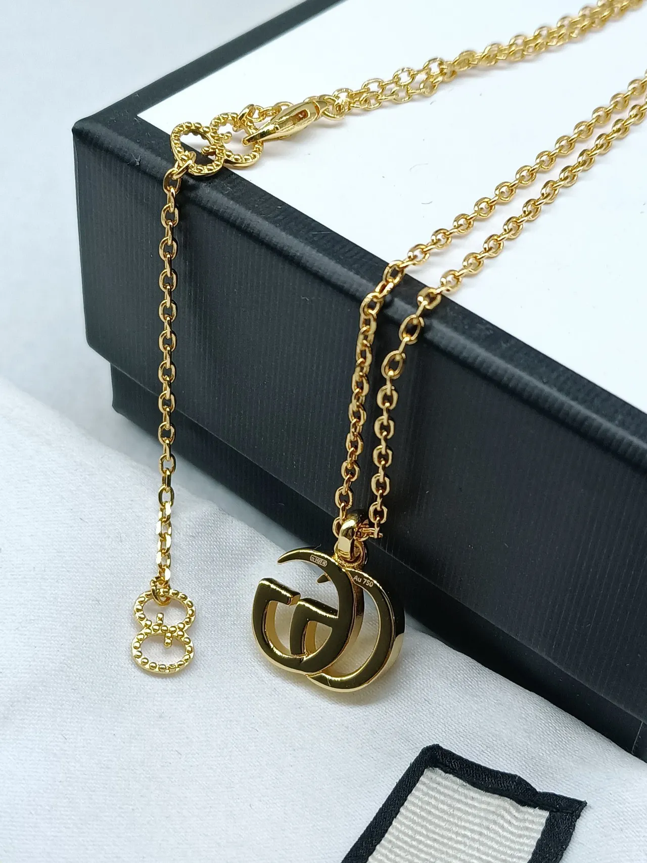 Gucci Double G Interlocking Logo Gold Tone মণিহারা 2