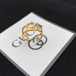 Gucci GG Marmont सोना पारदर्शी इंटरलॉकिंग डबल जी मोटिफ पॉलिश फिनिश अंगूठी