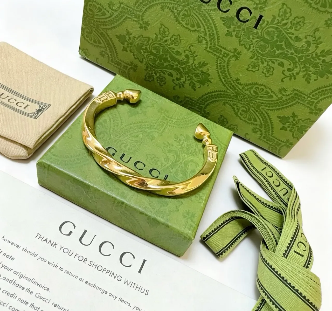 Gucci Gold Twisted Barrel Form Polished Finish Bracelet 7