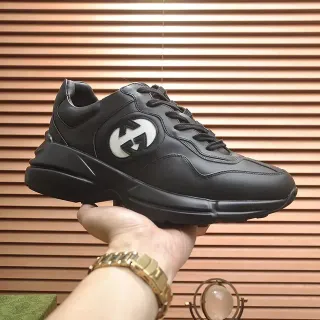 Gucci Rhyton Zapatillas Lifestyle de Cuero Negro Interlocking GG Logo