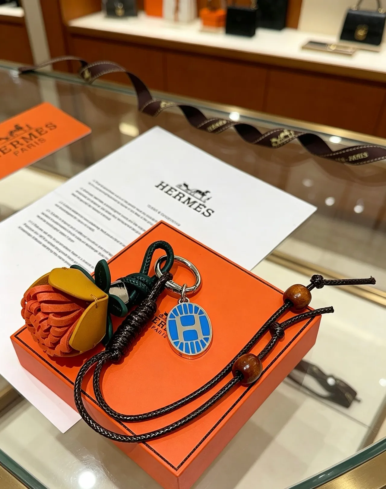 Hermès Rodeo Charm Orange Noir Cuir Tissé Fleur Poche à ouverture supérieure Sac à main 3