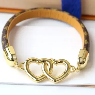 Louis Vuitton Pulsera Marrón Dorado Monograma Lona Pulida Charm Doble Corazón