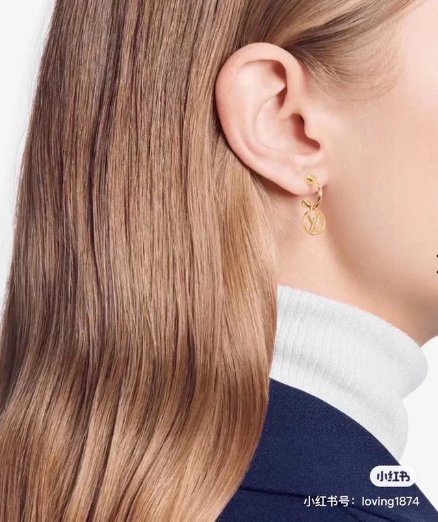 Louis Vuitton Boucles d'oreilles motif monogramme rond et fleur en ton doré 5