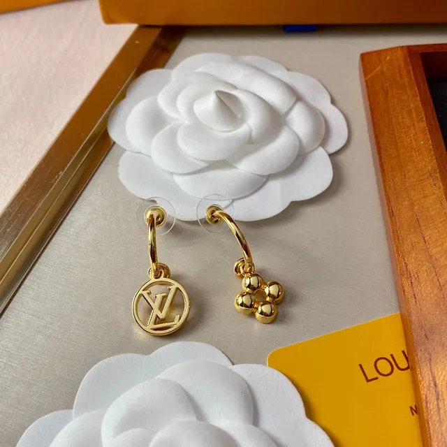 Louis Vuitton Boucles d'oreilles motif monogramme rond et fleur en ton doré 8